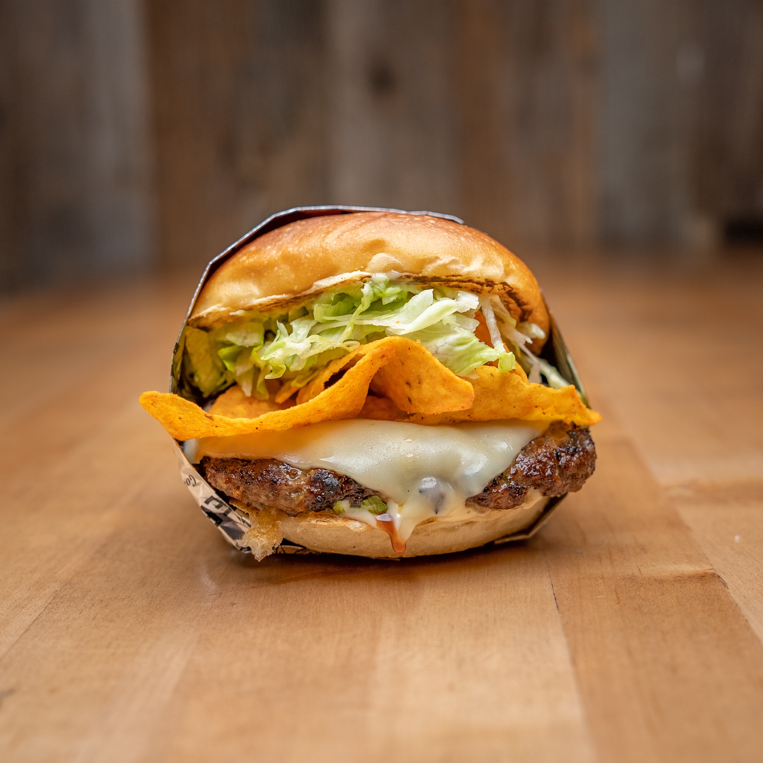 Big Chipper Burger - Fresh 1/3 lb halal beef patty on an Ace Bakery bri...